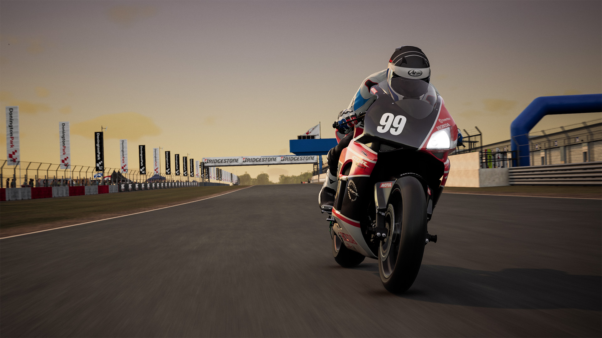 Rider in racing gear.